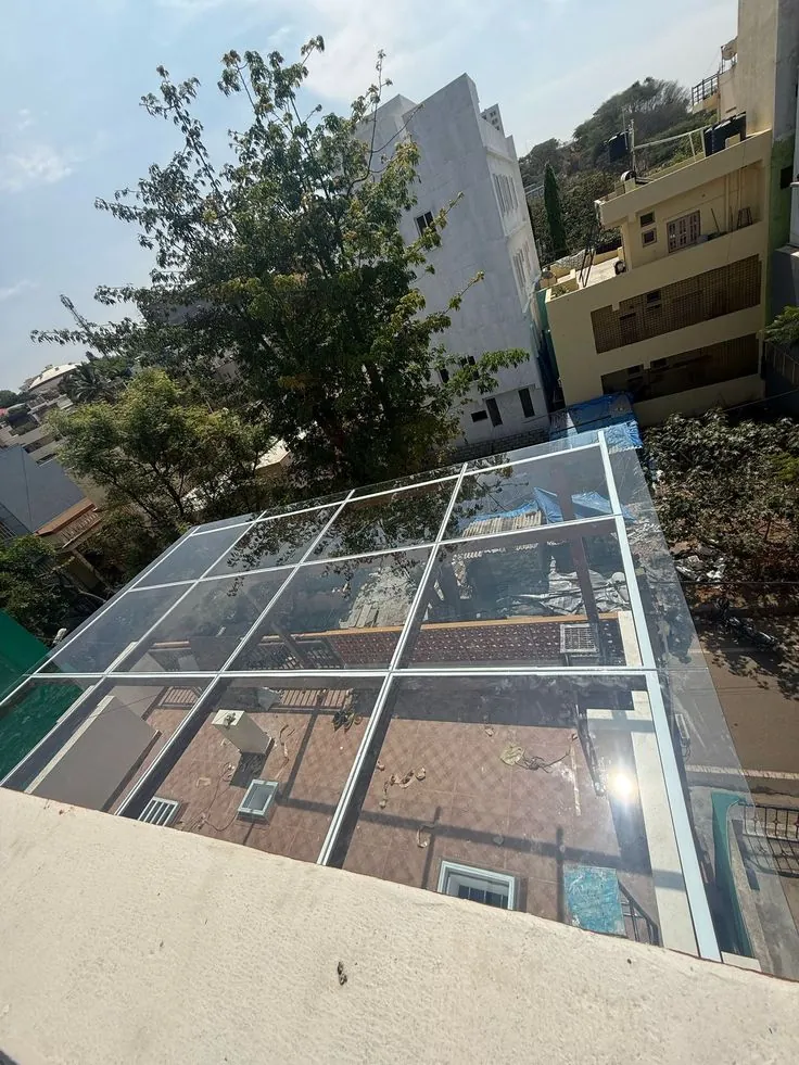 Framed glass roof covering a rooftop courtyard — BlueCrest, Egypt